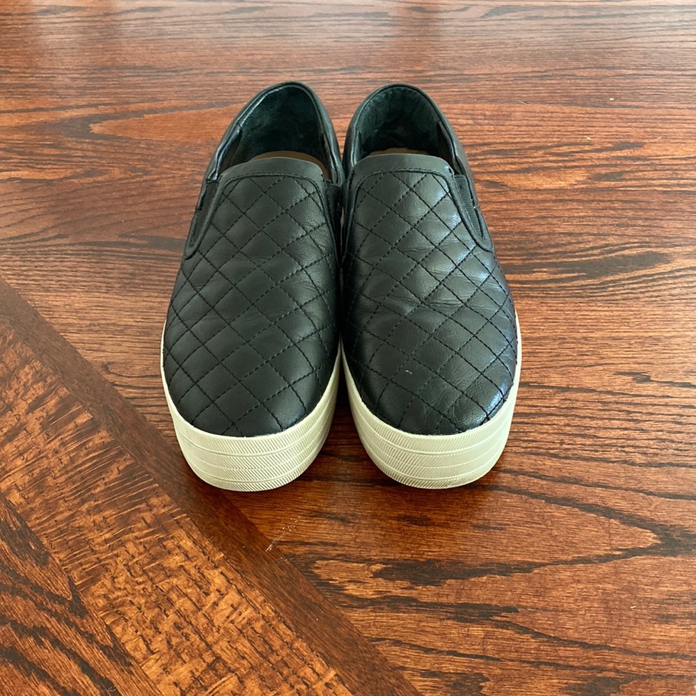 Black quilted leather platform sneakers